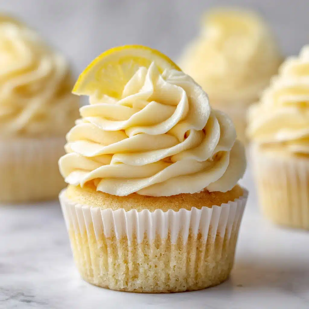 Cheesecake Stuffed Lemon Cupcakes with Lemon Frosting Recipe - Recipe Image